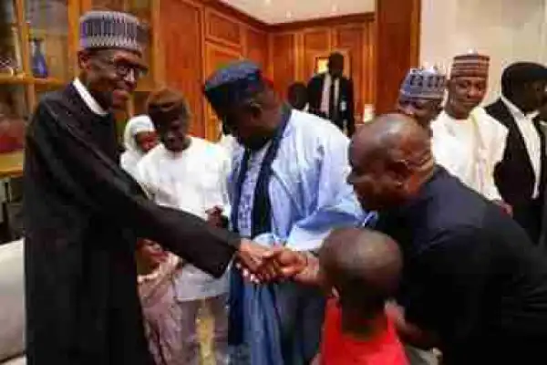 Governor Wike Bends To Greet President Buhari At Aso Villa (Photo)